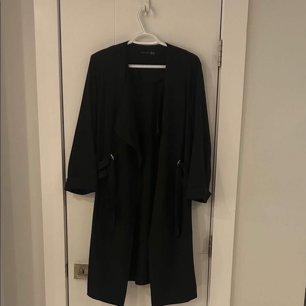 Black Tape_ Elegant Black Garment